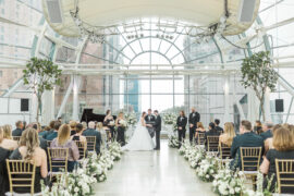 Wedding ceremony in all glass Indianapolis Artsgarden