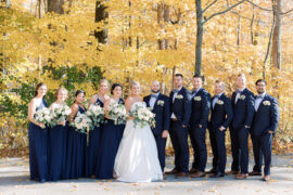 Bridal Party in front of beautiful fall trees